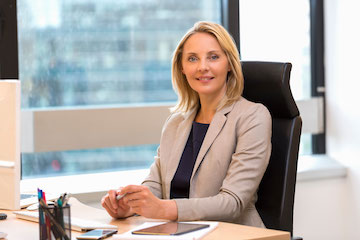 Female executive sitting at a desk
